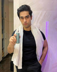 Guy holding texturising serum