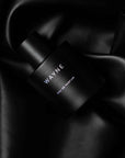 wayne winter perfume wrapped with black sheet