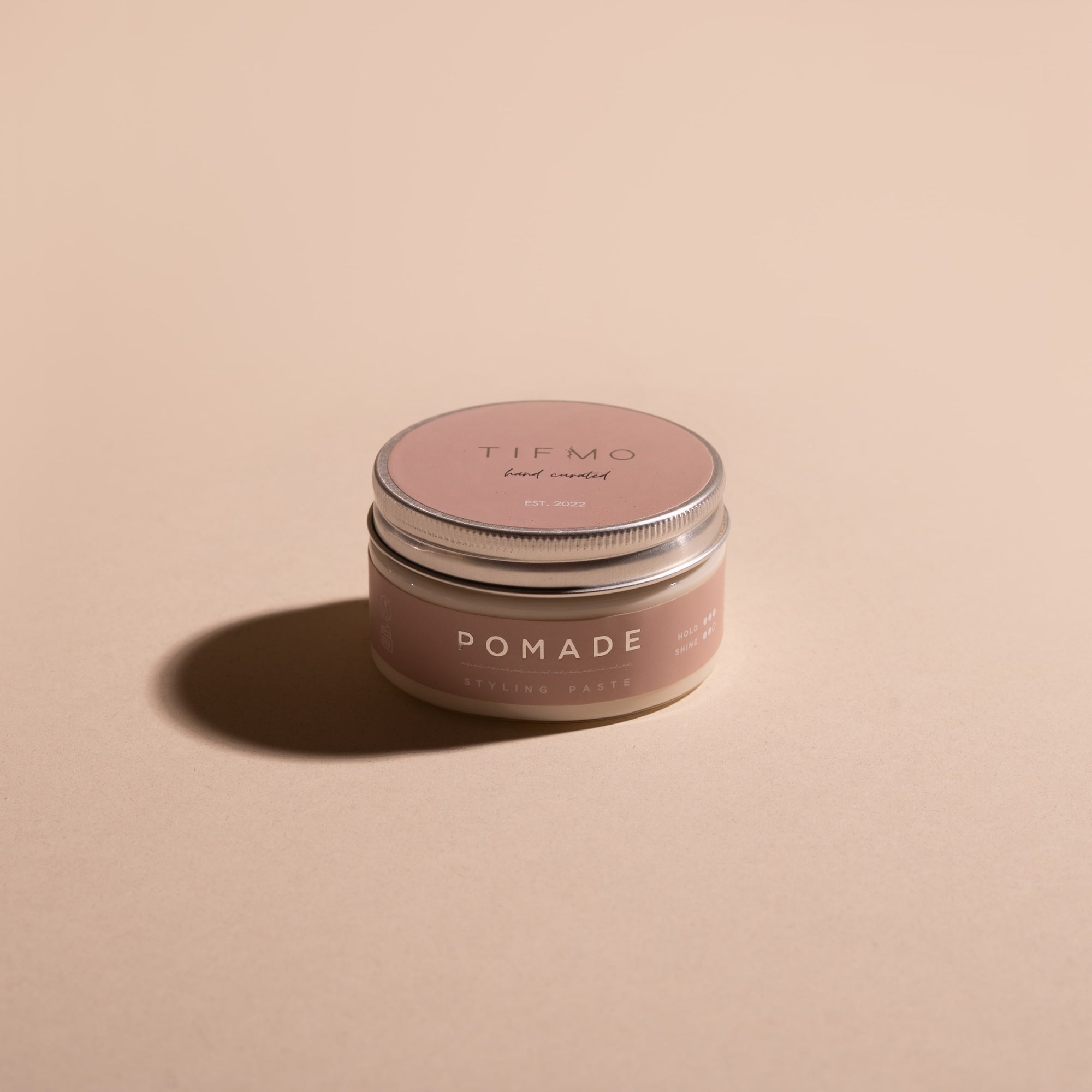 pomade pack with its shadow 